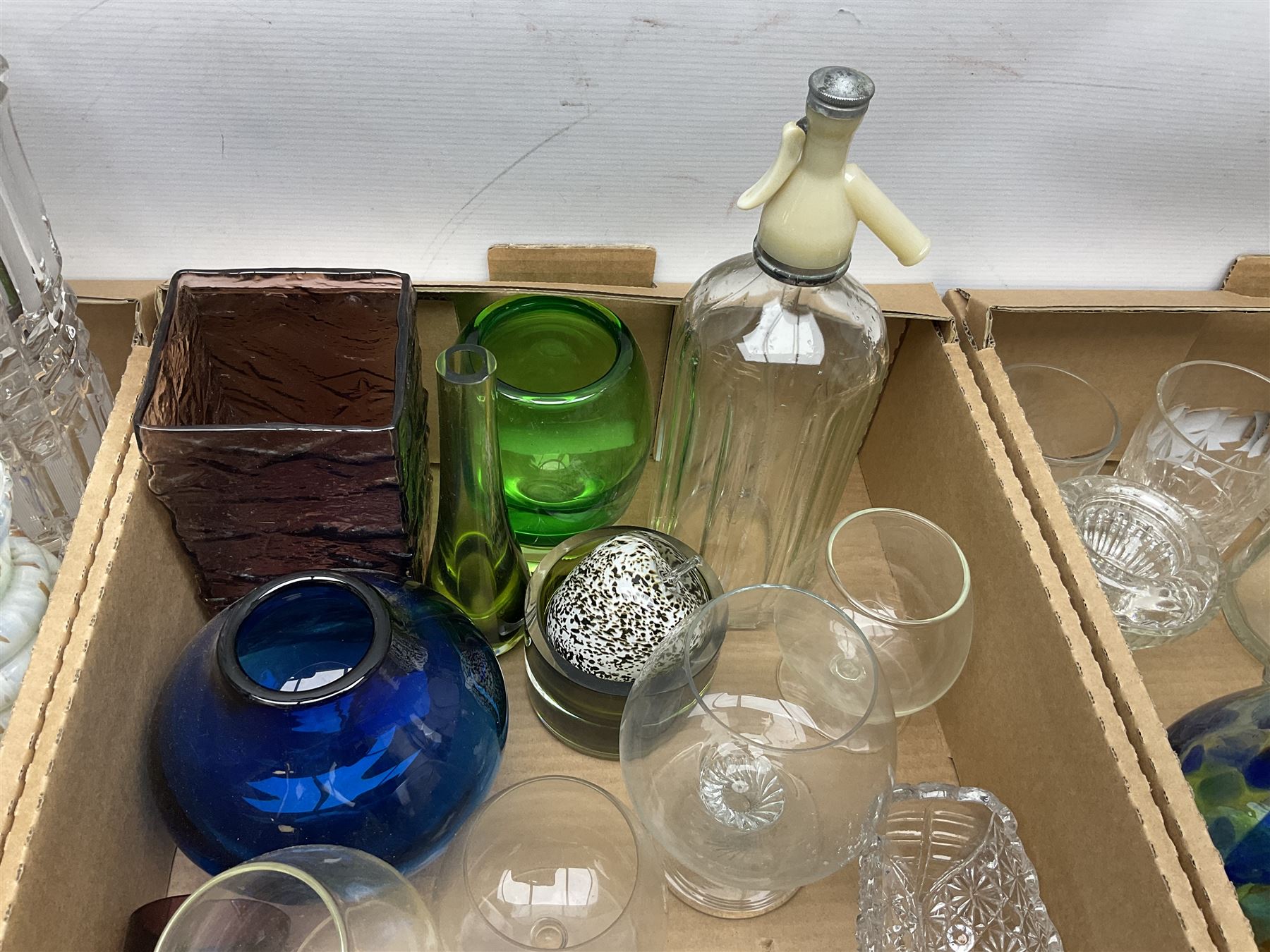 Large collection of glassware to include Schweppes soda syphon, Murano, vases, drinking glasses, coloured glass, cranberry etc in seven boxes