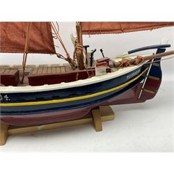 Wooden model of the Peterhead Herring Fishing Boat, Love Divine, PD404. on stand together with Wick Herring Fishing Boat, Galilee WK.1. on stand, L105cm, H64cm