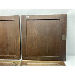 Pair of oak furniture door panels, carved in relief with a fox to one and a hound to the other, together with a pair of smaller oak panels, carved in relief with a hare to one and a grouse to the other, doors W63.cm x H62cm, panels W43cm x H60cm