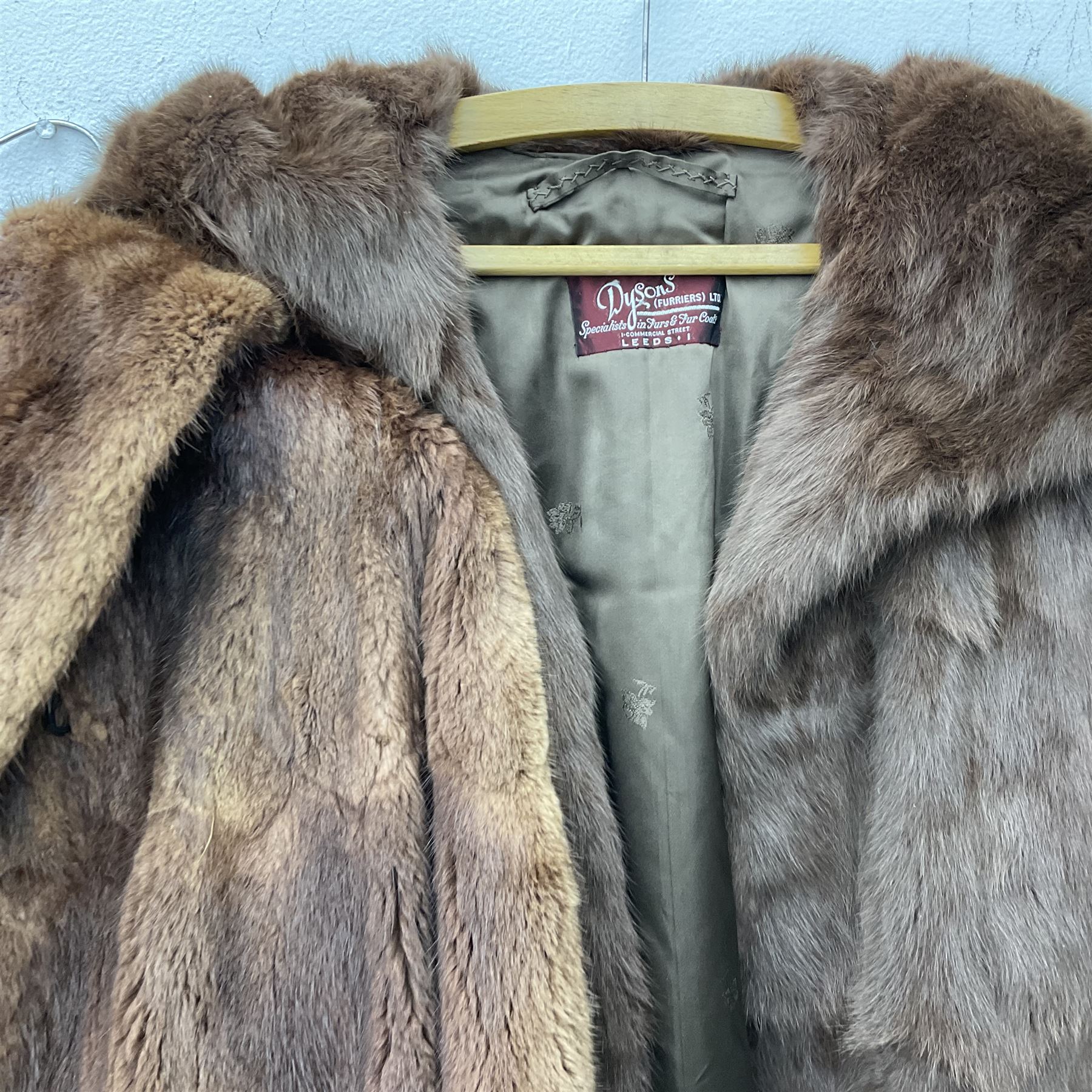 Four ladies three quarter length fur coats, by Dysons Furriers Ltd, Commercial St, Leeds, comprising of a light brown mink fur coat, two dark brown mink fur coats and another brown fur coat.  