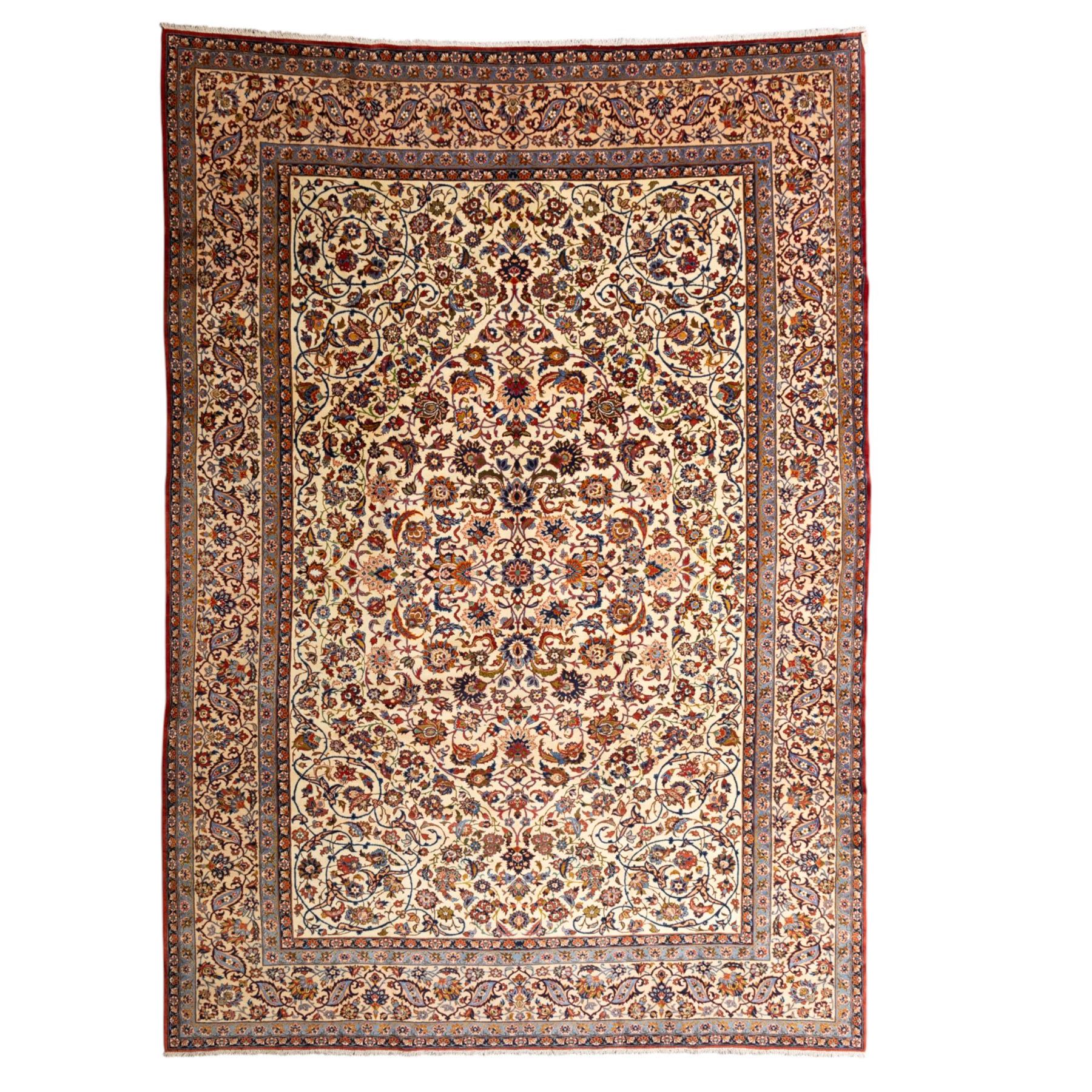 Central Persian Najafabad hand-knotted carpet, ivory field with an all-over scrolling floral design of palmettes, rosettes, and leafy vine work, enclosed by a wide floral main border flanked by multiple guard borders in madder red, indigo blue, green, and pale ochre, with cotton fringe ends 