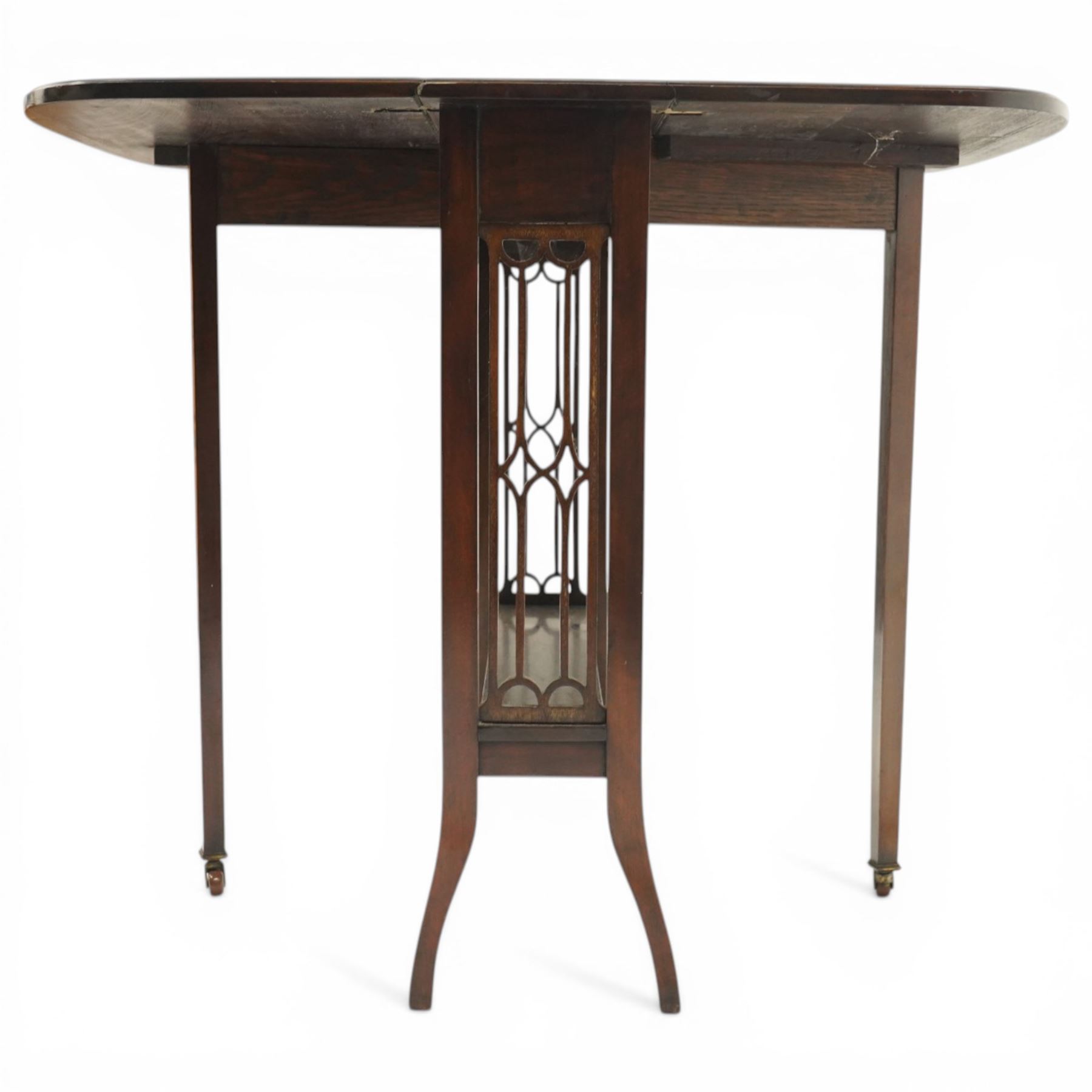 Edwardian mahogany Sutherland table, rectangular drop-leaf top with rounded corners, raised on gate-leg base with pierced end supports