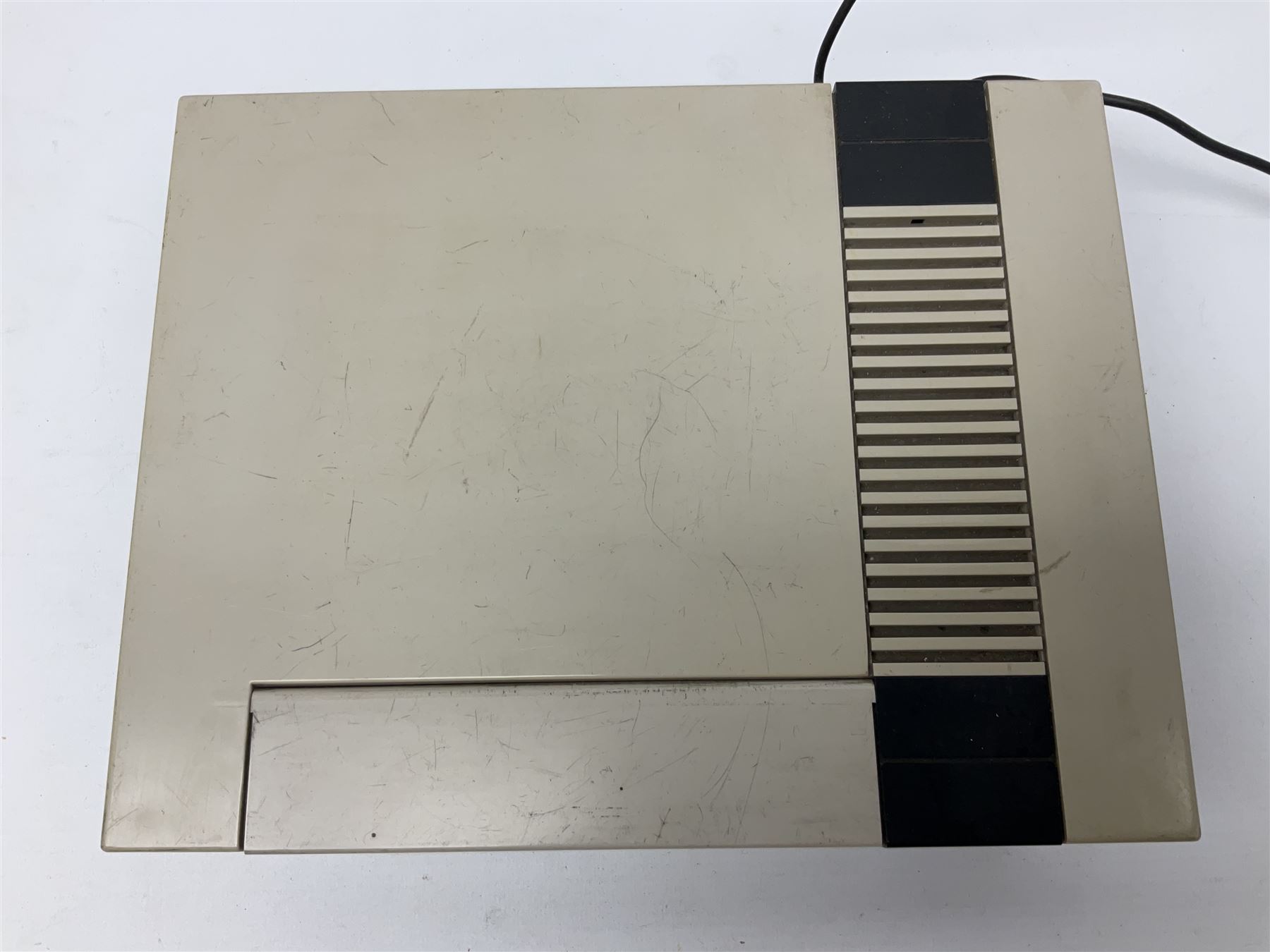 Nintendo Entertainment System (1985) console with two controllers, accessories and instruction booklet. NES Games ‘Duck Hunt’ with Nintendo Zapper gun, ‘Pinball’ and ‘Super Mario Bros.’, all with original sleeves and instruction booklets. NES game ‘Super Mario Bros. 2’ cartridge only