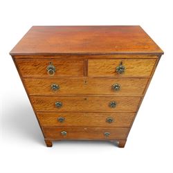 Edwardian mahogany tall chest, rectangular top with reeded edge, above two short over four long graduating drawers, raised on bracket feet