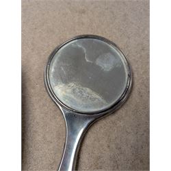Silver mounted hand mirror and clothes brush, both hallmarked 