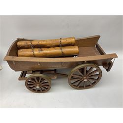 Four Melba Ware Shire horse figures and another similar, and three wood carts