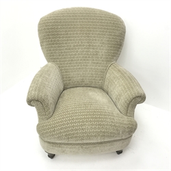 Victorian style spoon back armchair, upholstered in a beige fabric, turned supports, W82cm