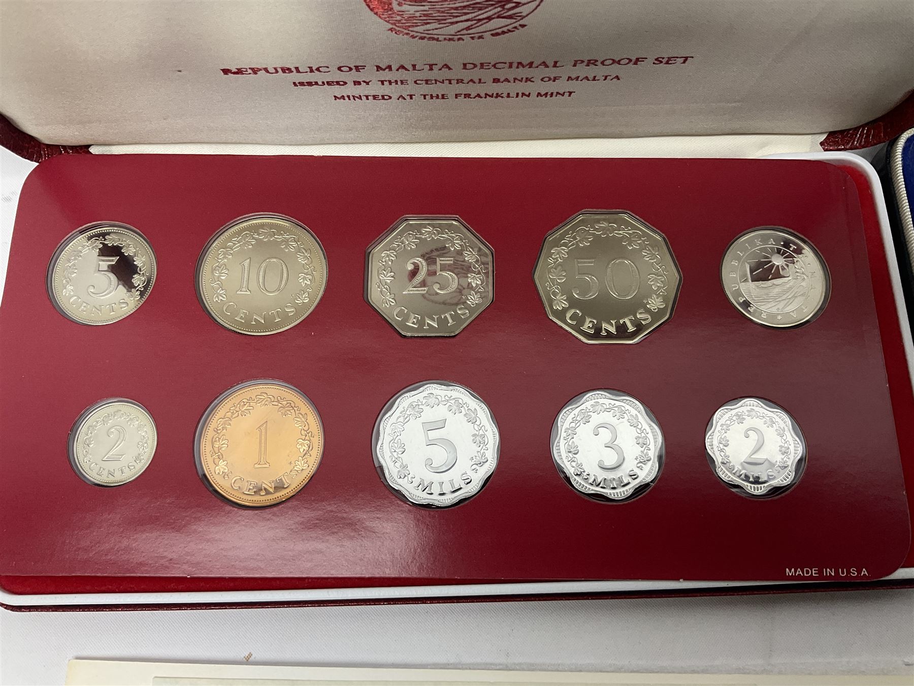First National Coinage of Barbados 1973 proof eight coin set, from ten dollars to one cent, the ten dollar coin minted in sterling silver, the five dollar coin minted in 800 silver, and a Barbados 1974 proof eight coin set, both minted at The Franklin Mint, cased with certificates; two Republic of Malta decimal proof coin sets, dated 1978 and 1979, the 1979 one pound coin minted in sterling silver, both minted at The Franklin Mint, cased with certificates; Cayman Islands 1973 proof eight coin set, minted at the Royal Canadian Mint, cased; and a Cayman Islands 1979 proof eight coin set, the five dollar to fifty cents coins each minted in sterling silver, minted at the Franklin Mint, cased with certificate (6)