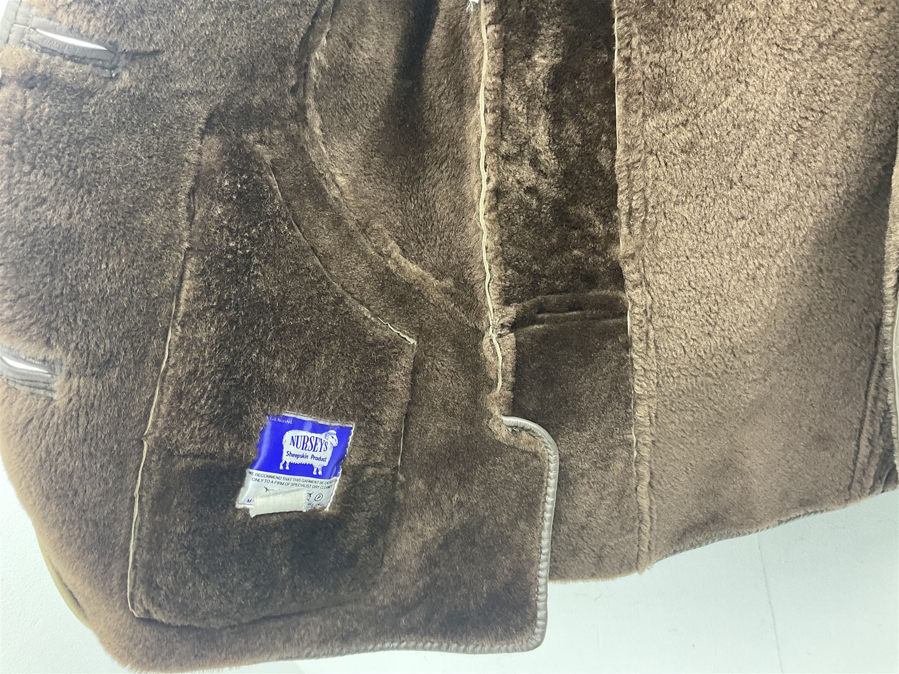 Two sheepskin jackets, one ladies jacket size 12, by Nurseys, and a gentleman's jacket by Baily's   