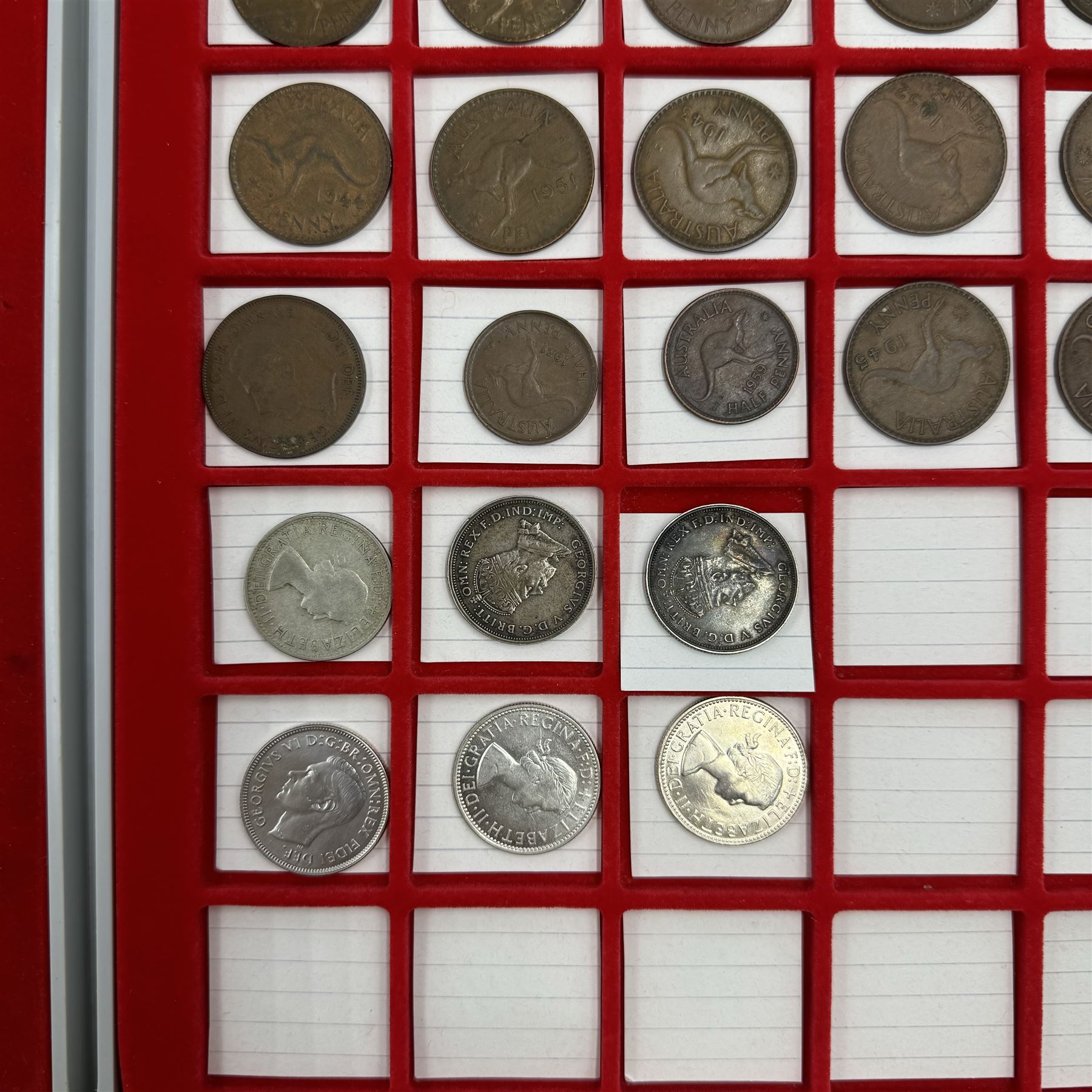 Australian coinage, including two King George V 1927 'Parliament House' one florins, various sixpences, Queen Elizabeth 1961 and other threepence pies, pennies etc, housed in two Lindner coin trays