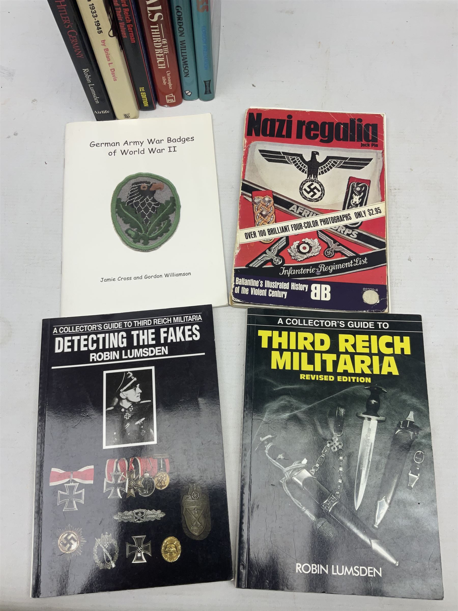 Ten books of German medal interest including Robin Lumsden: Medals and Decorations of Hitler's Germany; Forman's Guide to Third Reich German Awards ... and Their Values. Signed by the author; Christopher Ailsby: Combat Medals of The Third Reich; Gordon Williamson: The Iron Cross A History 1813-1957 and Knights of the Iron Cross A History 1939-1945; and five others (10)