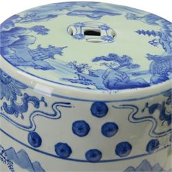 Pair of Chinese blue and white garden stools, decorated with pagodas a landscape, H40cm 