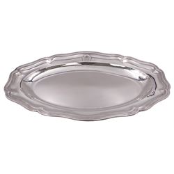 Mid eighteenth century French silver platter, of shaped oval form with dished centre, reeded edge and engraved monogram to side, marked with makers mark for Francois Jaubert Paris, and other marks, probably Maison Commune mark, and charge mark, L43cm, approximate weight 36.55 ozt (1136.87 grams)