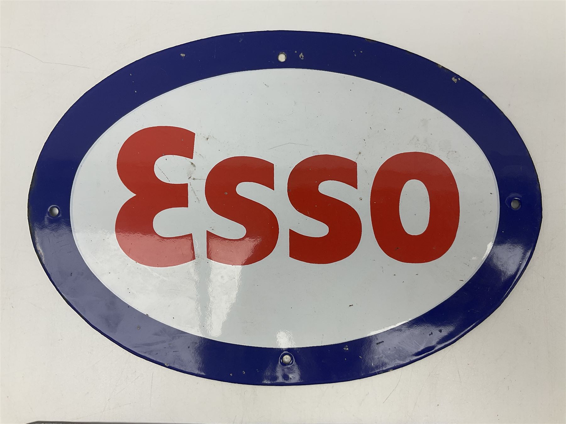 Enamelled Esso advertising type sign together with a Minnesota number plate, Esso H23cm