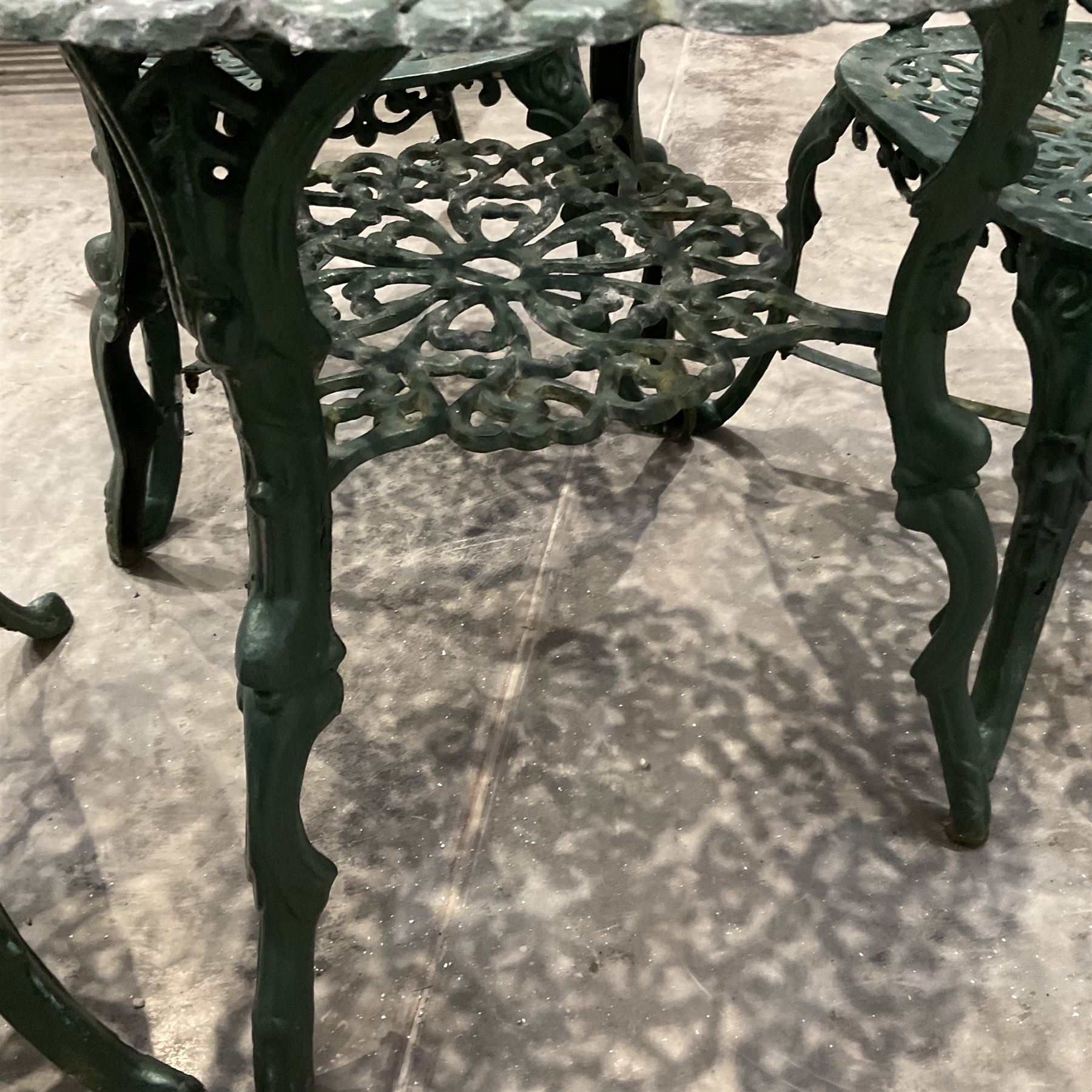 Cast aluminium garden table and four chairs painted in green - THIS LOT IS TO BE COLLECTED BY APPOINTMENT FROM DUGGLEBY STORAGE, GREAT HILL, EASTFIELD, SCARBOROUGH, YO11 3TX