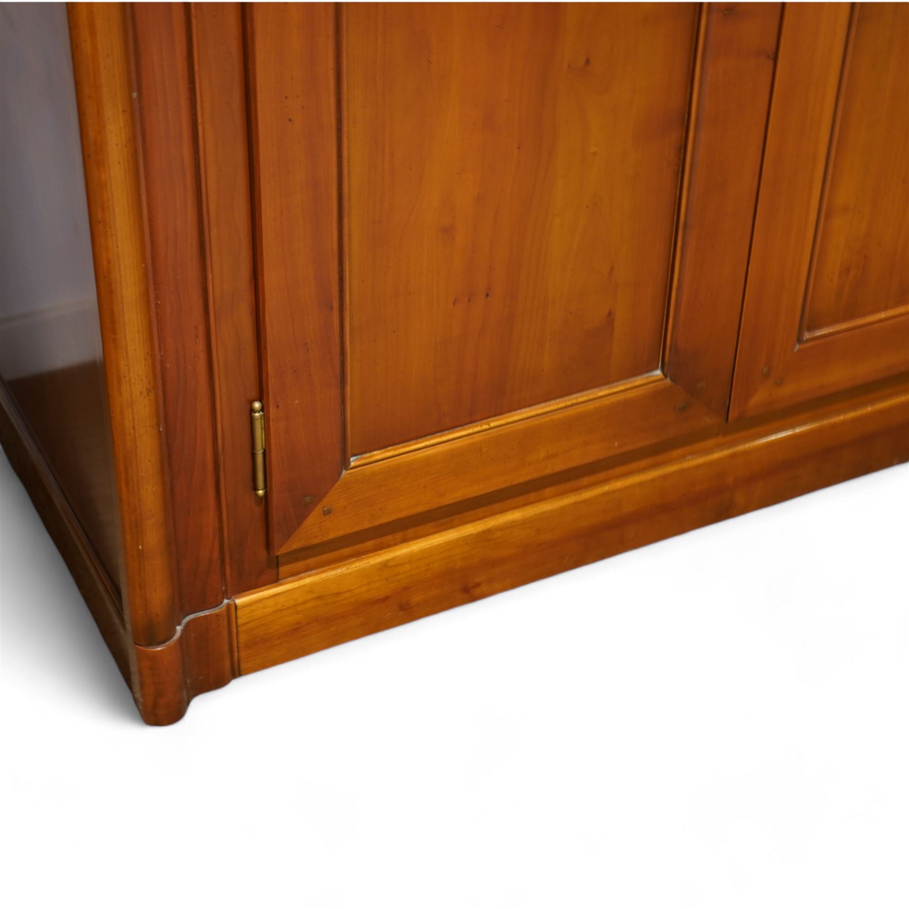 Brigitte Forestier - French cherry wood four door wardrobe unit, fitted with hanging and shelving