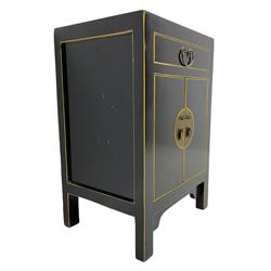 Small Chinese ebonised lamp cabinet, fitted with drawer and cupboard, gilded detail