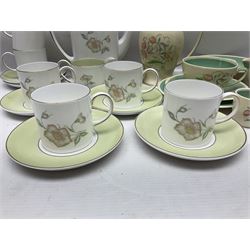 Susie Cooper Dresden Sprays pattern breakfast set, including coffee pot, sugar bowl, milk jug, egg cup, teacup trio and bowl, together with a Susie Cooper Wild Rose pattern coffee service for six