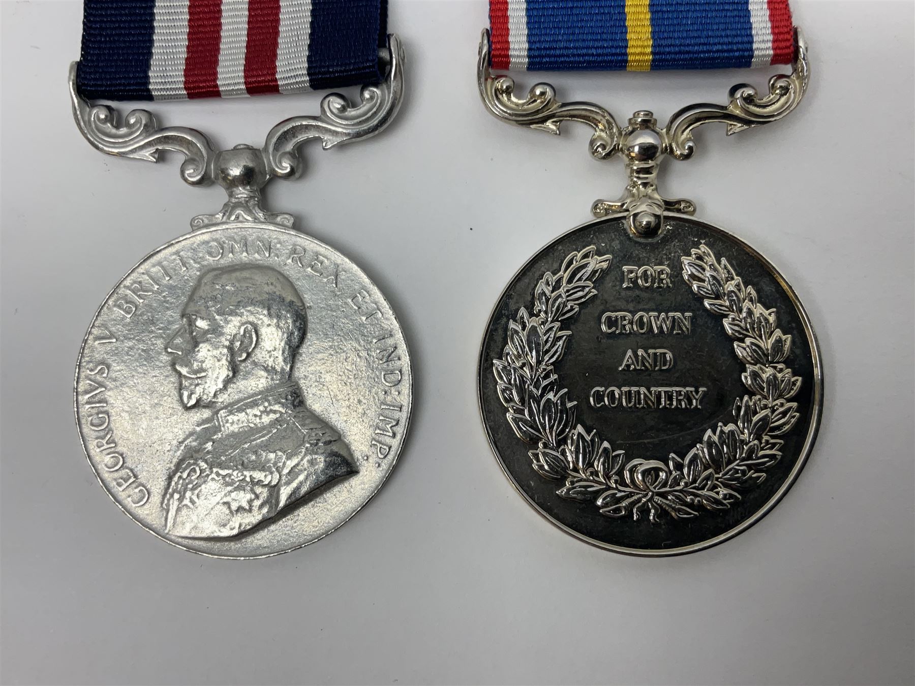 Gaunt & Son Territorial Force Nursing Service cape medal; cased; WW1 British War Medal and 1914-15 Star (names erased); two MID oak leaves; Polish and American medals; eight replica medals including VC, MM, Air Crew Europe Star etc and replica group of five WW2 miniatures etc