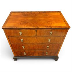 Early 20th century figured walnut chest, rectangular top with burr crossbanding, fitted with two short over three long drawers with brass drop-handles, lower moulded edge over shell-carved cabriole feet