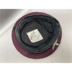 Four paratrooper berets - Russian, Italian, British and Foreign Legion; all with badges (4)