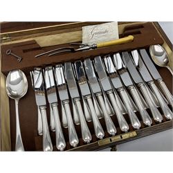 Twelve place setting canteen of cutlery by Lee & Wigfull Ltd, cased in an oak  chest, with key, meat carvers are missing, H18cm, L44cm 