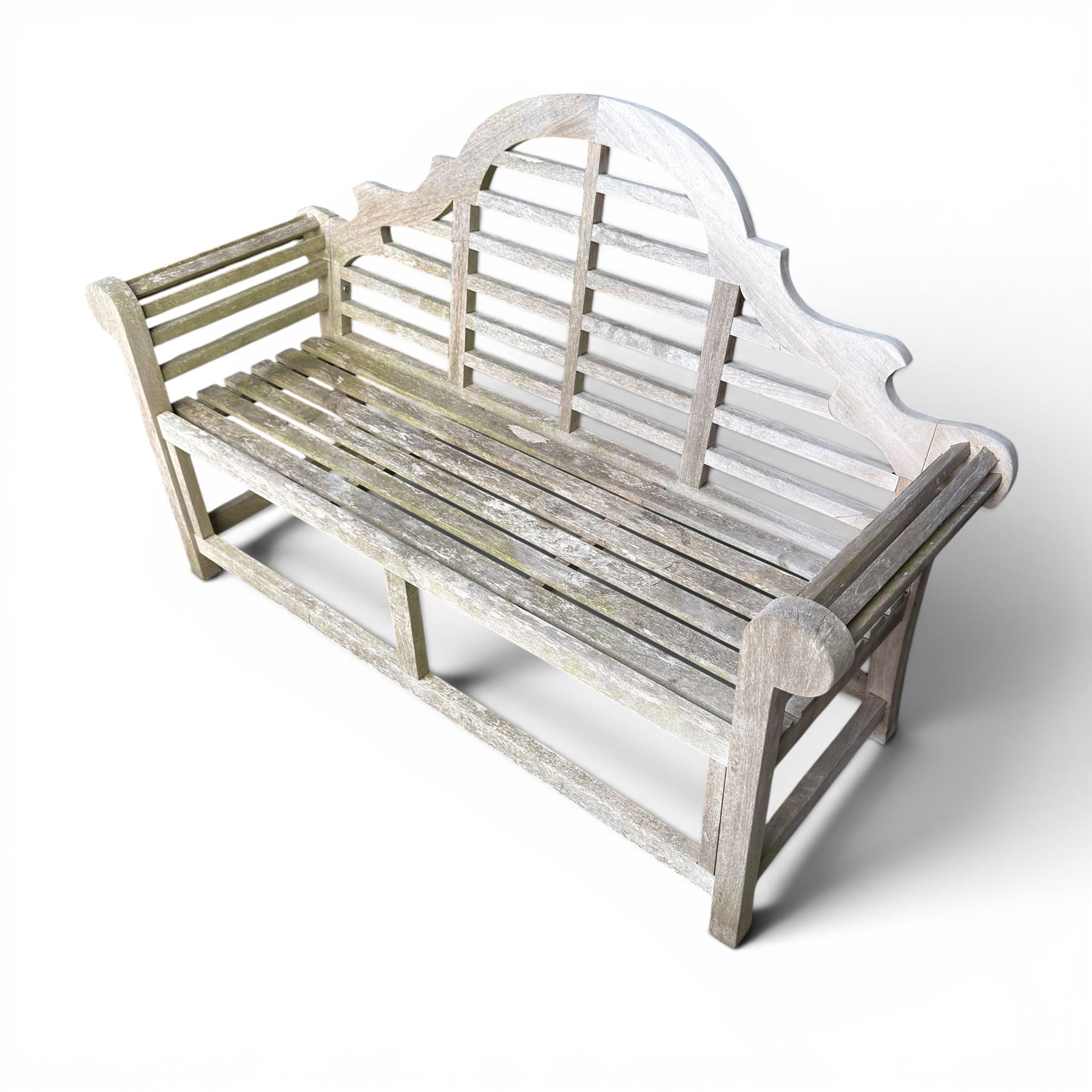 Lutyens design teak garden bench, shaped arched and slatted back over rolled arms and slatted seat, raised on square supports with box-stretcher