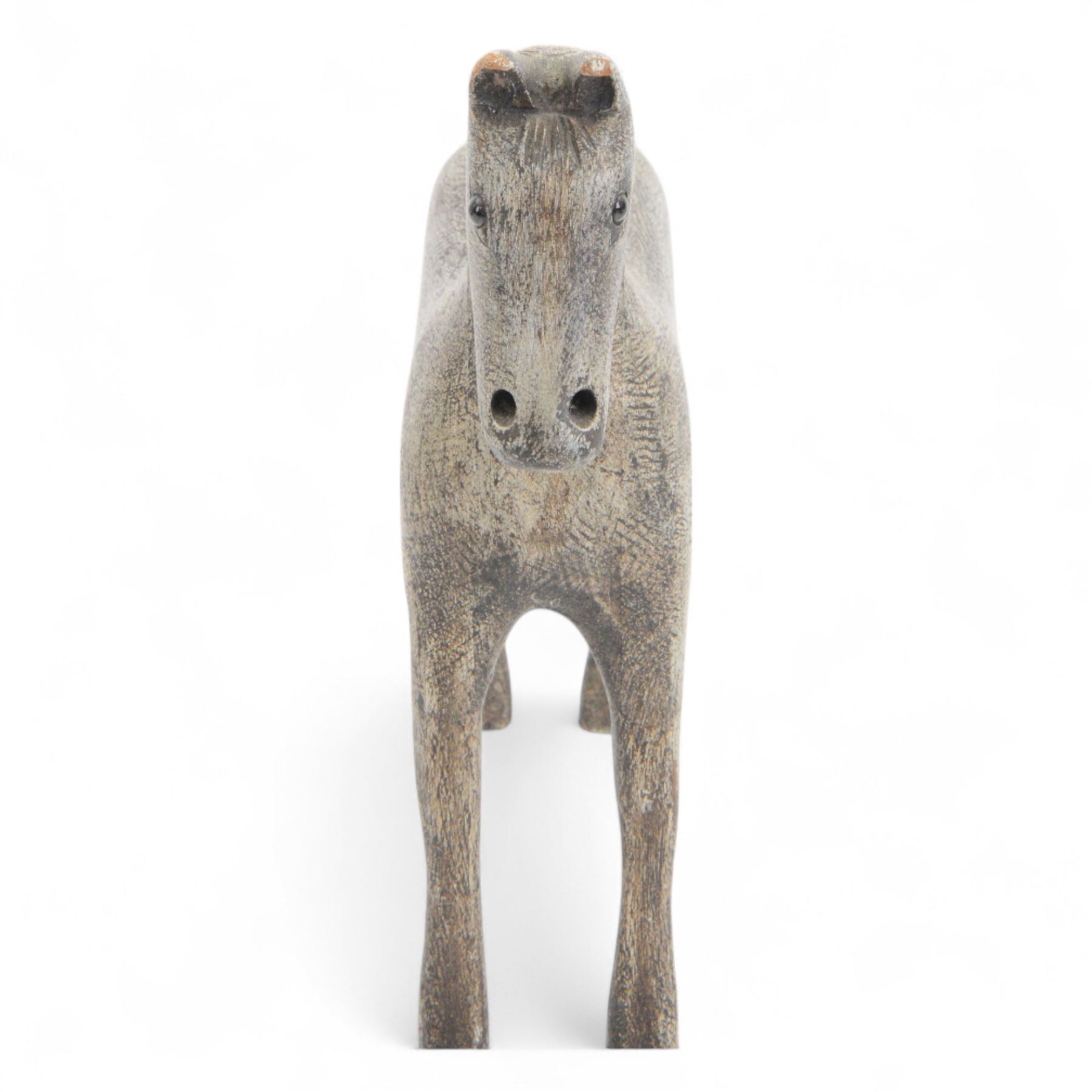 Carved Folk Art wooden horse, with glass eyes, H33cm