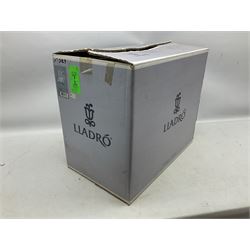 Lladro figure, Garden of Dreams, modelled as a woman reclining in front of trellis of flowers on a mahogany base, limited edition 3129/4000, sculpted by  José Puche, with original box, no 7634, year issued 1994, year retired 1996, H32cm