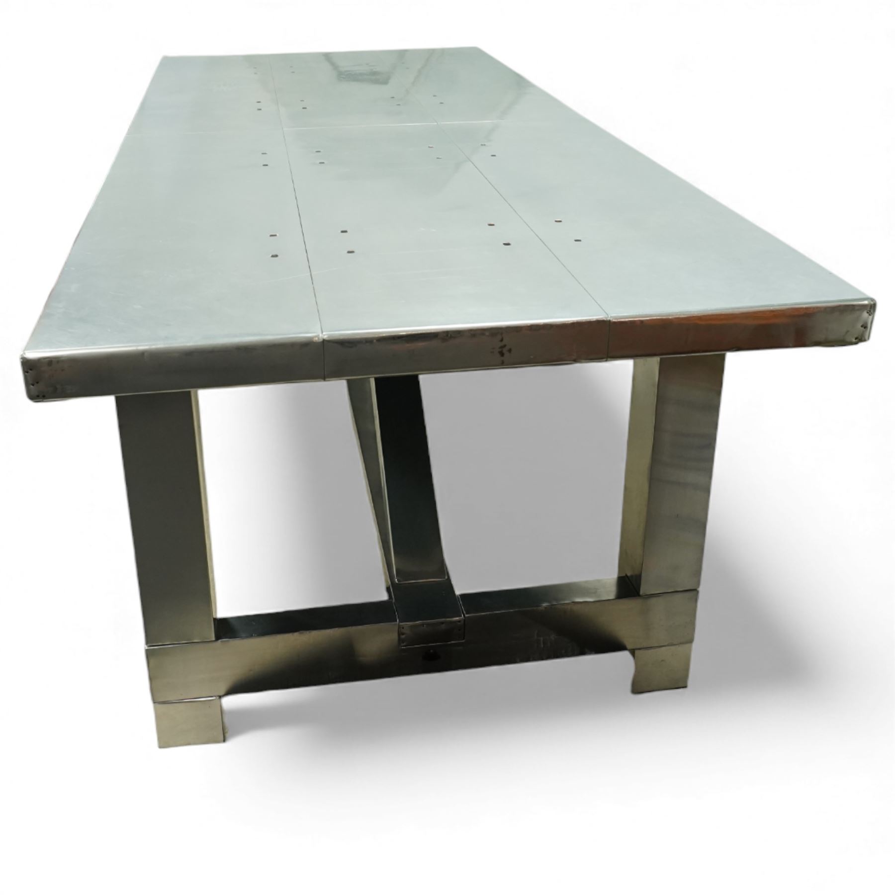 Timothy Oulton - Boston Aero aluminium dining table, rectangular riveted aluminium clad top on matching angular supports with stretchered base