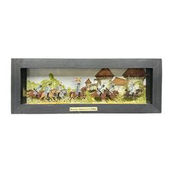 Seven case flat figures, Prussian Dragoons, with hand painted back drop, paper label to the front marked 'German Dragoner C1765', H10cm, L29cm 