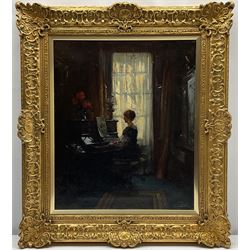 Albert Chevallier Tayler (Newlyn School 1862-1925): Drawing Room Interior with Lady playing the Piano, oil on canvas, signed and indistinctly dated 60cm x 50cm