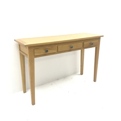 Light oak side table, two short and one long drawers, square tapering supports, W120cm, H77cm, D40cm