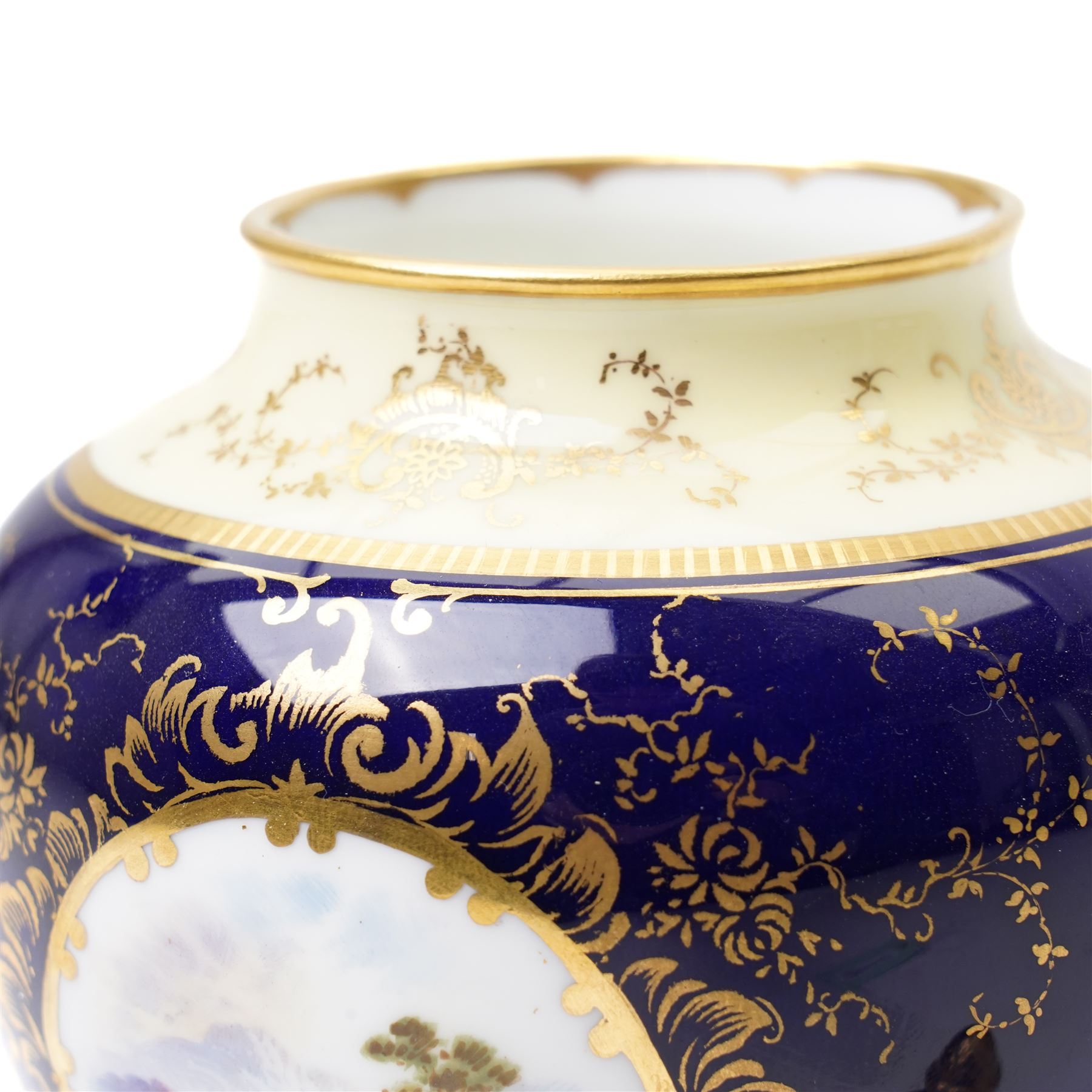 Coalport pot pourri jar and cover, circa 1920, the dark blue ground painted with landscape panels of Helvelly by E.O. (Ted) Ball, printed and painted marks to base, H17cm