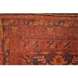  Persian Bokhara red ground rug, repeating floral border, 293cm x 200cm  
