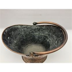 Arts & Crafts style copper coal bucket, of cowl form with swing handle, with embossed floral and foliate decoration, height including handle H52cm