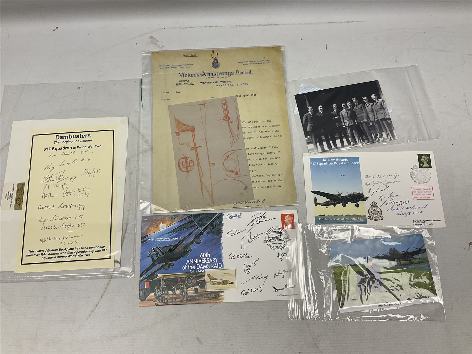 Dambusters 617 Squadron memorabilia - three signed photographs of Lancaster aircraft in flight, group photograph, copy of Vickers-Armstongs letter and drawing from Barnes Wallis, The History of 617 Squadron by Sqn. Ldr. S.J. Hillier, facsimile sets of signatures, FDCs, sheet music, Richard Todd signed photograph and greeting card, etc
