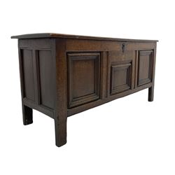 18th century oak coffer or blanket box, moulded rectangular top over panelled front and sides, the triple panel front decorated with applied mouldings, on stile supports