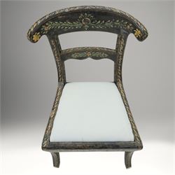 Early 20th century Anglo-Indian painted and inlaid armchairs, each with shaped top rail decorated with polychrome floral motifs above turned spindle galleries, shaped open arms and upholstered seats, on square supports with similar painted decoration