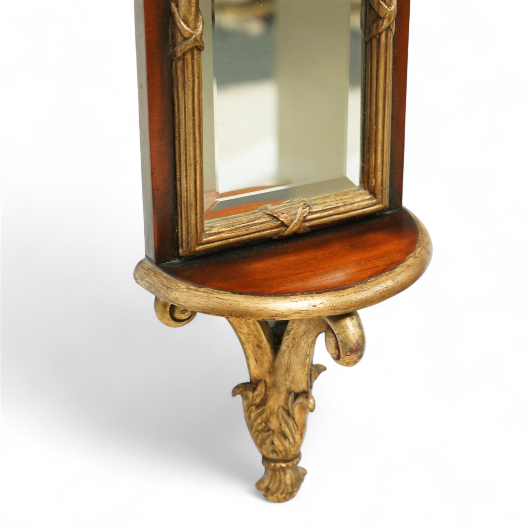 Theodore Alexander - three contemporary neoclassical design giltwood and mahogany three-sectional pier mirrors, broken pediment with central bronze urn finial above triple mirror plates, flanked by gilt acanthus-carved supports and moulded frame 