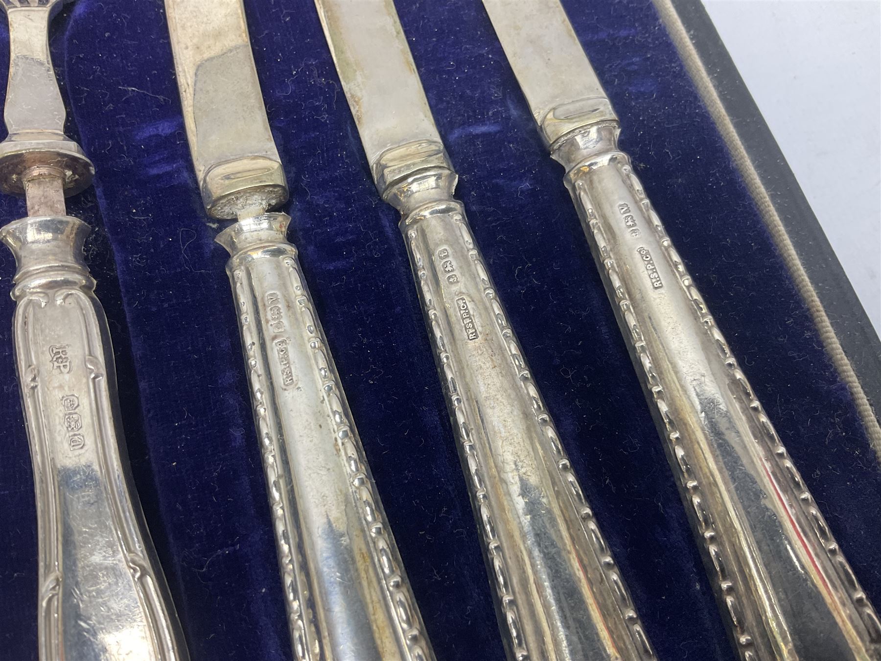 Cased set of six silver handled dessert knives and forks, hallmarked 