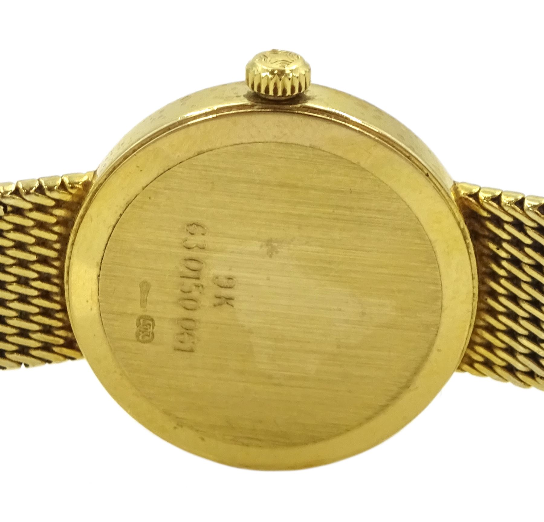 Zenith ladies 9ct gold quartz wristwatch, white enamel dial with baton hour markers, on integral 9ct gold bracelet strap