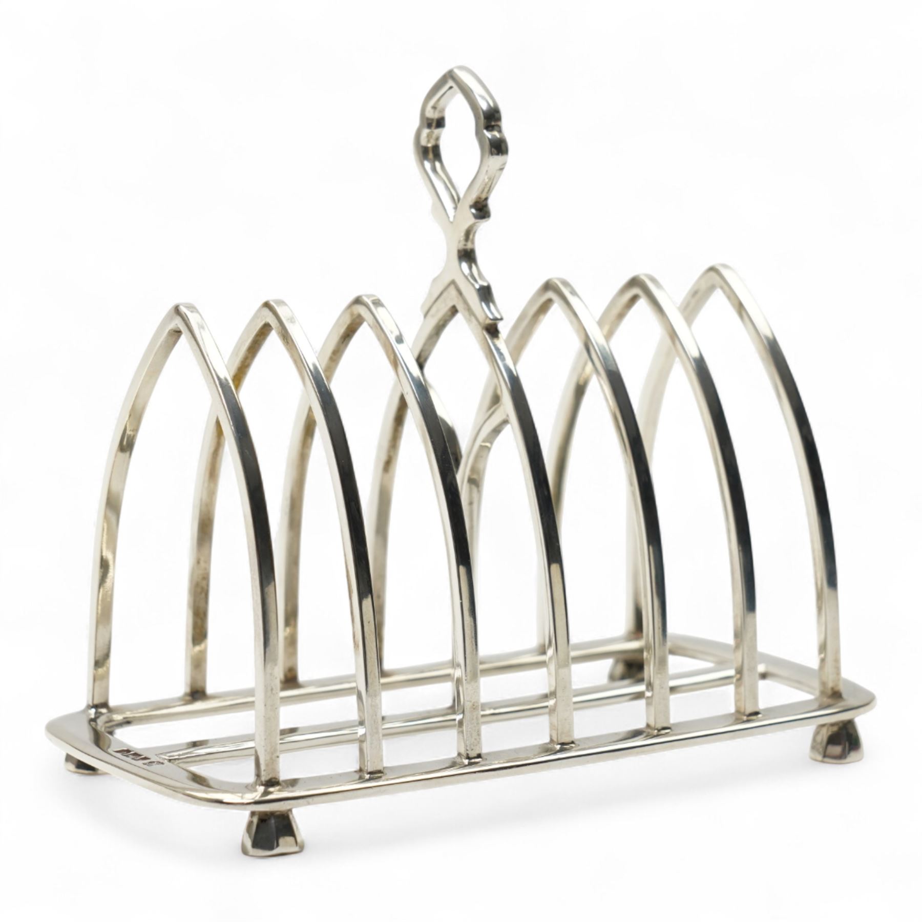 Silver six division toast rack with loop handle and short panel sided supports L13cm Sheffield 1913 Maker Thomas Bradbury & Sons 