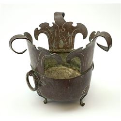 A Dutch copper planter, with three stylised foliate side panels, twin ring handles, and raised upon three curved feet, the interior inscribed VEMMETOFTE 1762, H27.5cm.