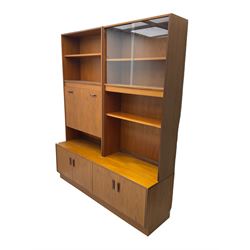 G-Plan - mid-20th century teak modular wall cabinet, fitted with shelves, display cabinet, fall front compartment and two double cupboards