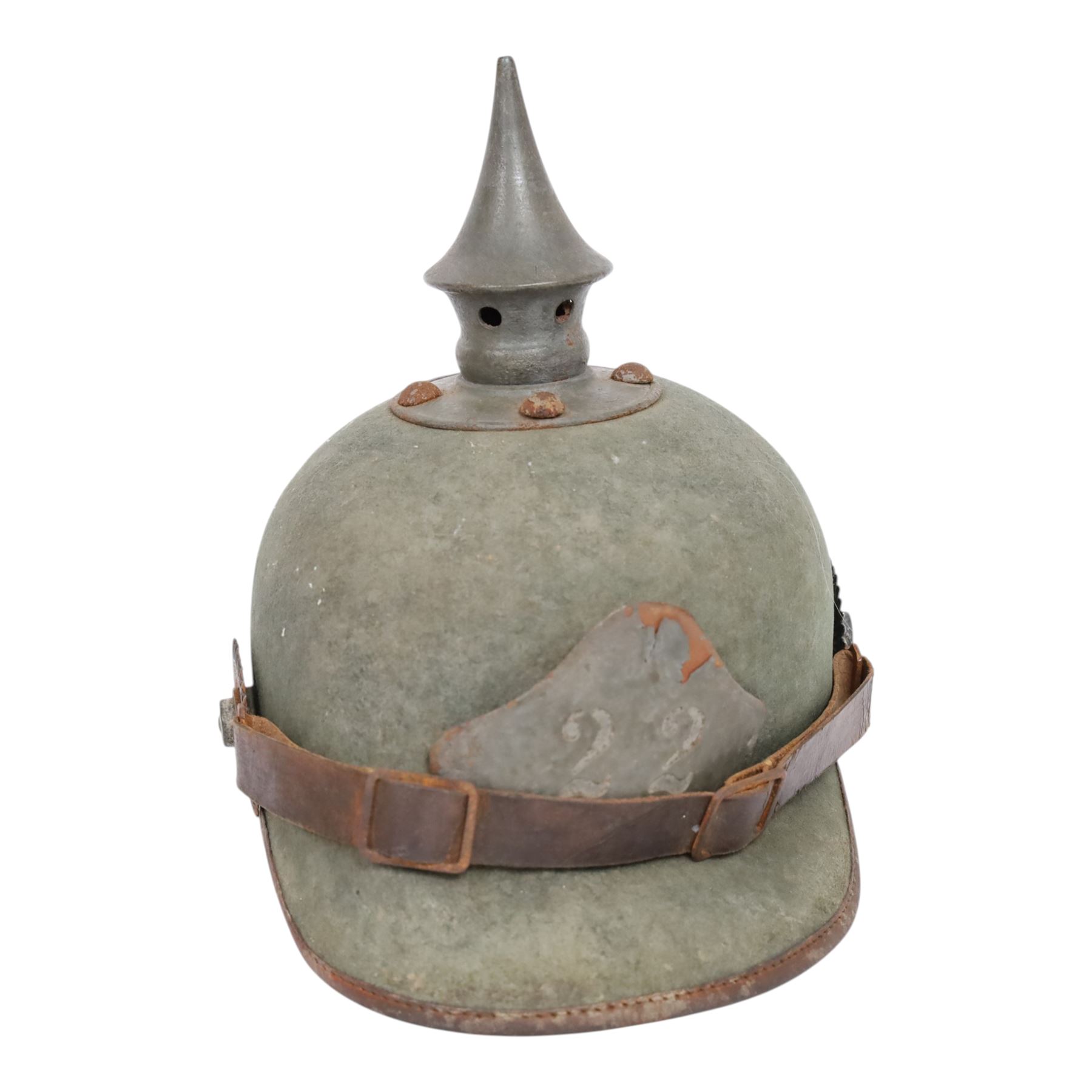 WWI Prussian 22nd regiment Ersatz Felt Pickelhaube, the grey felt skull with steel spike finial, 22 helmet plate and leather chin strap, one side with a black cockade, the other black and red,  the inner back brim stencilled BA 1X Wm Kleddinghaus & C, Elberfeld, 1916, H24cm
