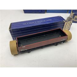 Hornby Dublo - nineteen goods wagons comprising 32040 Goods Van D1 (SR) in LMS stickered box, DR375 Goods Van D1 (GW), D303 Open Goods Wagon D1 (GW), 32044, 32076, 32052, 32021, 32074, 32056, 32065, DR379, 32070, 32020, DR373, two x 32075, High Sided Wagon D2 (LMS) in NE stickered box; all boxed; Tank Wagon D1 (Esso) and DR380 Meat Van D1; both in later unassociated boxes (19)