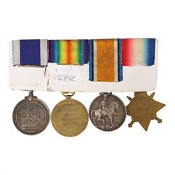 WWI Naval Long Service Group of Four Medals, comprising 1914-15 Star, British War medal, Victory Medal and Royal Naval Long Service and Good Conduct medal, awarded to J.33725, P.M.Flynn Boy.1., R.N. (later A.B. H.M.S. Queen Elizabeth)