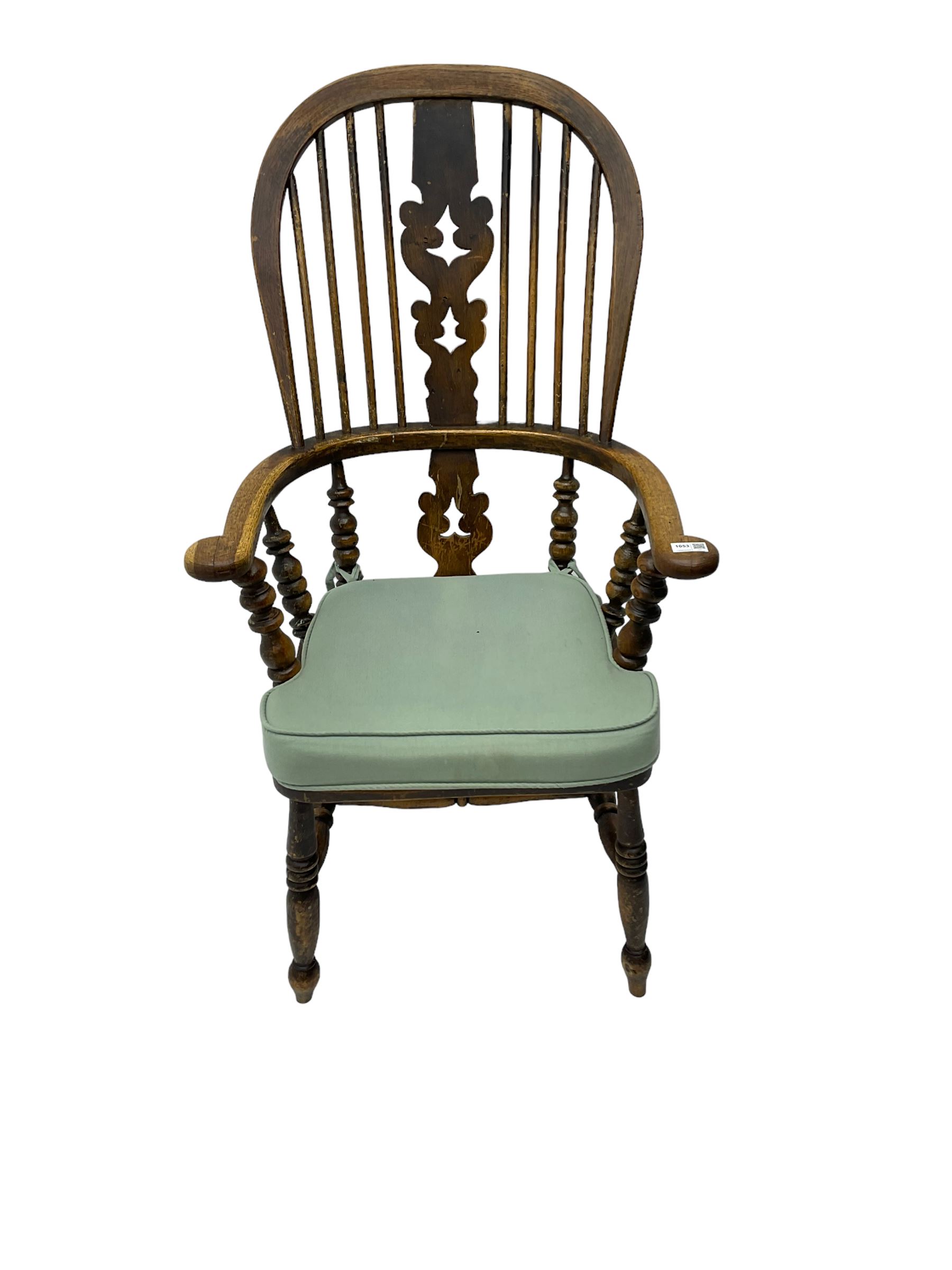 Late 19th century Yorkshire Windsor armchair, high stick back with pierced and fretwork splat, turned supports joined by H-stretcher