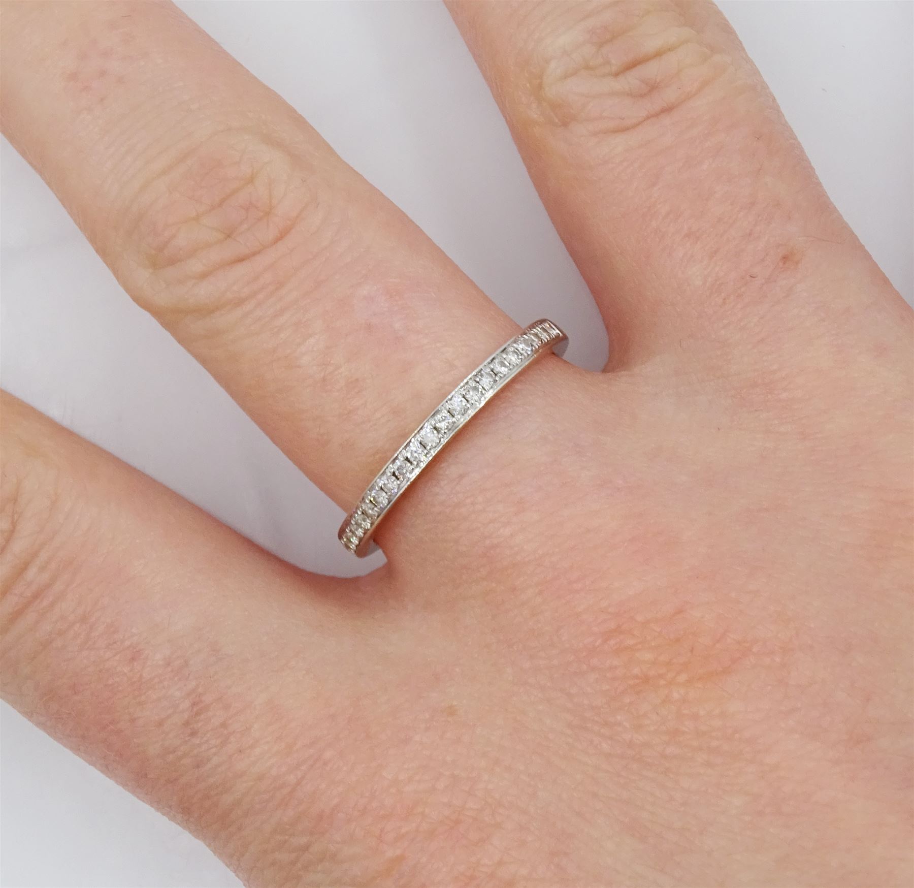 18ct white gold channel set diamond half eternity ring, London 2014